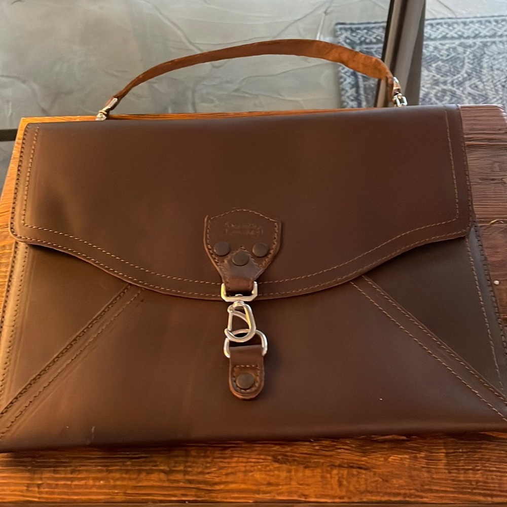 Saddleback Leather Co. briefcase. Never used. 13” wide; 9.5” tall